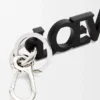 Charm z charakterystycznym motywem loewe z gładkiej skóry cielęcej