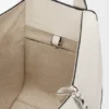 Kompaktowa torba typu „Hammock” z motywem futurystycznego kota, wykonana z klasycznej skóry cielęcej Kompaktowa torba typu „Hammock” z motywem futurystycznego kota, wykonana z klasycznej skóry cielęcej