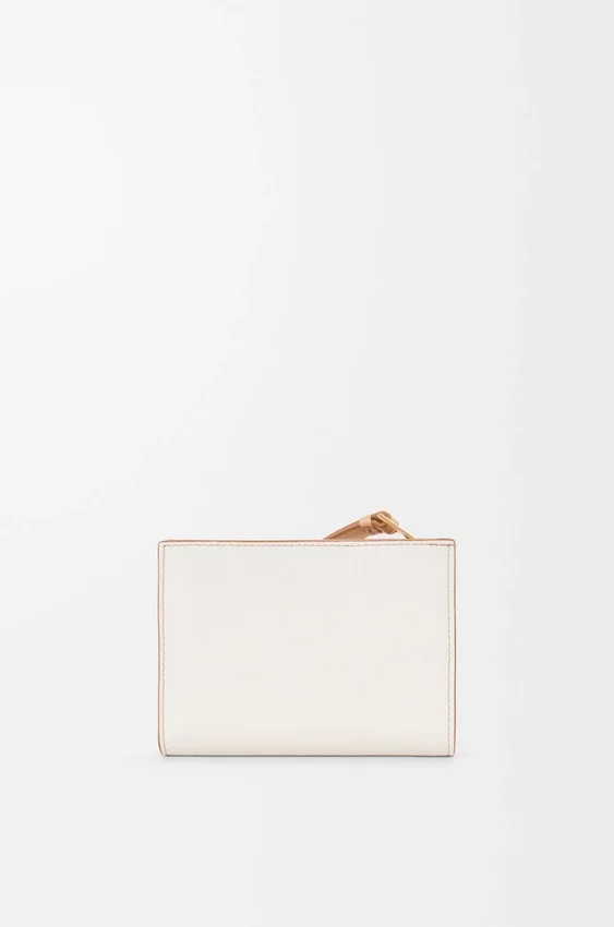 Kompaktowy portfel Puzzle z klasycznej skóry cielęcej Kompaktowy portfel Puzzle z klasycznej skóry cielęcej