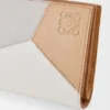 Kompaktowy portfel Puzzle z klasycznej skóry cielęcej Kompaktowy portfel Puzzle z klasycznej skóry cielęcej
