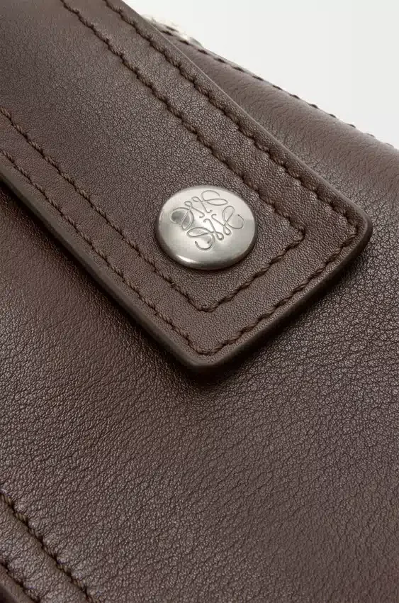 Mała torba Puzzle Biker z błyszczącej skóry cielęcej Mała torba Puzzle Biker z błyszczącej skóry cielęcej