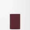 Mały portfel pionowy z fakturą „Pebble” z błyszczącej skóry cielęcej typu nappa Mały portfel pionowy z fakturą „Pebble” z błyszczącej skóry cielęcej typu nappa