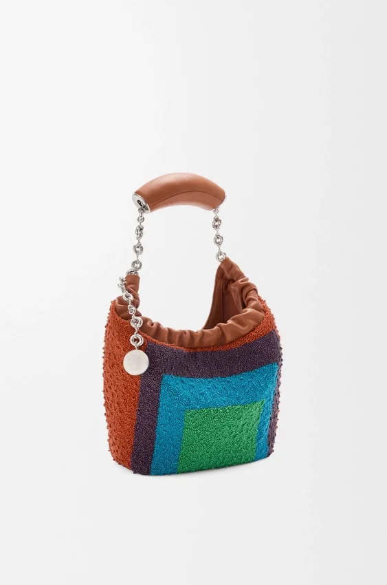 Mini torebka „Squeeze” z koralikowanej skóry Mini torebka „Squeeze” z koralikowanej skóry