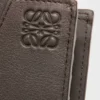 Składany portfel na monety Puzzle z klasycznej skóry cielęcej Składany portfel na monety Puzzle z klasycznej skóry cielęcej