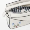 Torba Futurist Cat Mini Puzzle z klasycznej skóry cielęcej Torba Futurist Cat Mini Puzzle z klasycznej skóry cielęcej