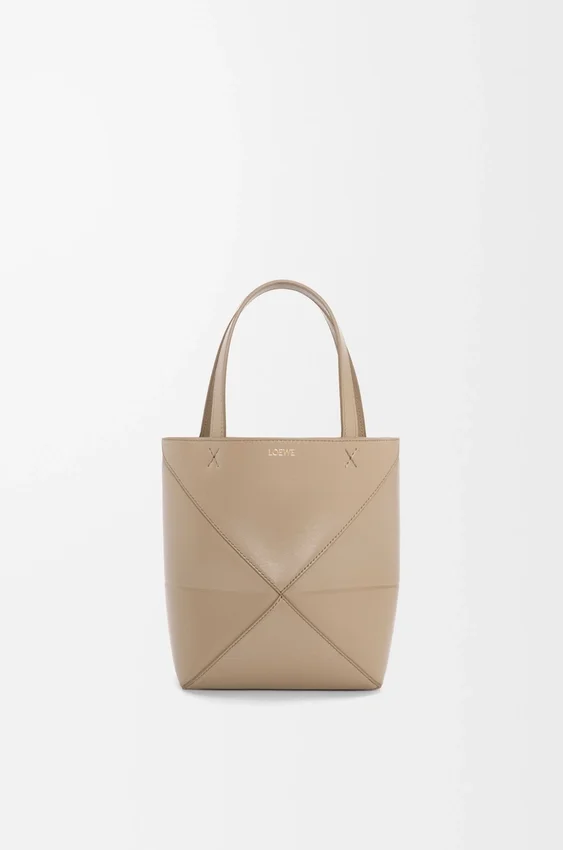 Torba Mini Puzzle Fold z błyszczącej skóry cielęcej Torba Mini Puzzle Fold z błyszczącej skóry cielęcej