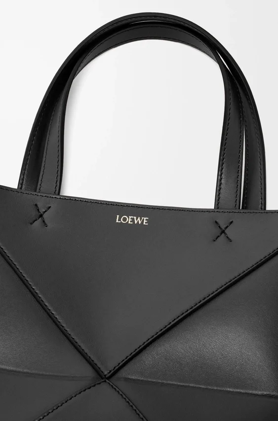 Torba Mini Puzzle Fold z błyszczącej skóry cielęcej Torba Mini Puzzle Fold z błyszczącej skóry cielęcej