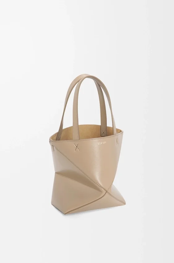 Torba Mini Puzzle Fold z błyszczącej skóry cielęcej Torba Mini Puzzle Fold z błyszczącej skóry cielęcej
