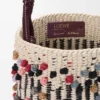 Torba typu bucket z sznurka, skóry i wełny Torba typu bucket z sznurka, skóry i wełny
